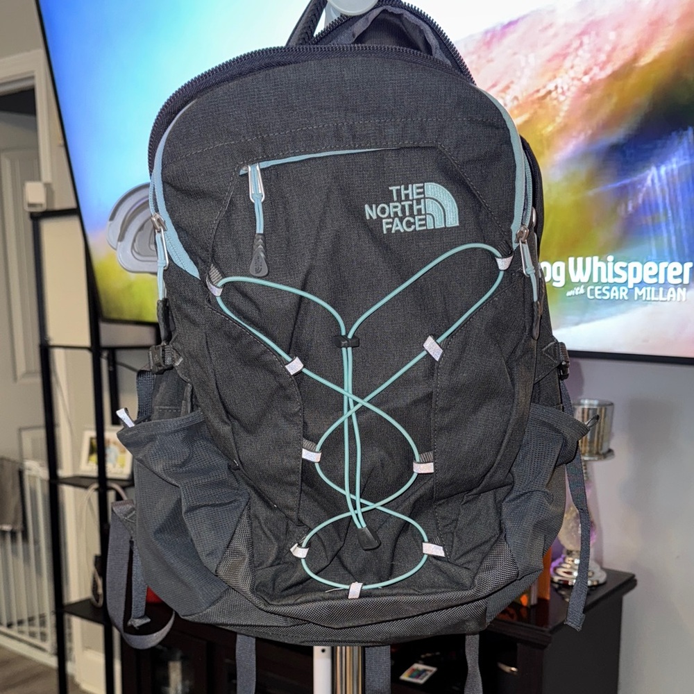The North Face Charcoal Backpack with Light Blue Details made for Laptop